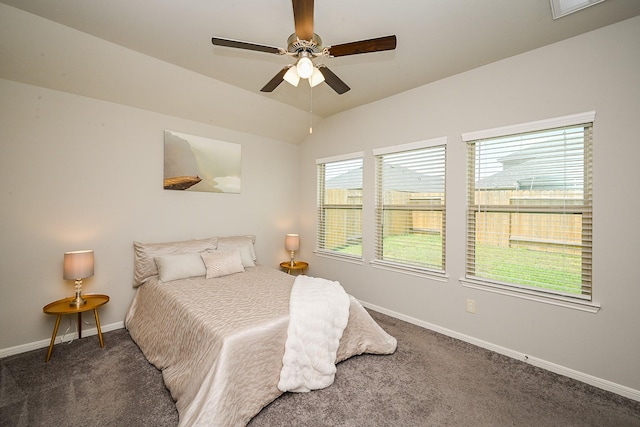 10130 Barn Owl Trl, Magnolia, TX 77354 - carpeted bedroom featuring baseboards, a ceiling fan, and lofted ceiling