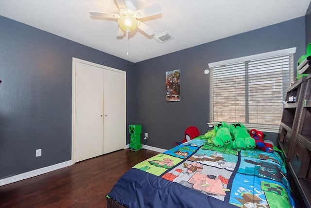 1803 Fallow Ln, Houston, TX 77049 - bedroom featuring wood finished floors, baseboards, ceiling fan, and a closet