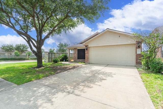 1803 Fallow Ln, Houston, TX 77049 - ranch-style home featuring brick siding, driveway, and an attached garage