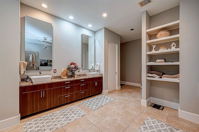 536 Rutland Pl, Houston, TX 77007 - bathroom featuring double vanity, tile patterned floors, recessed lighting, and baseboards