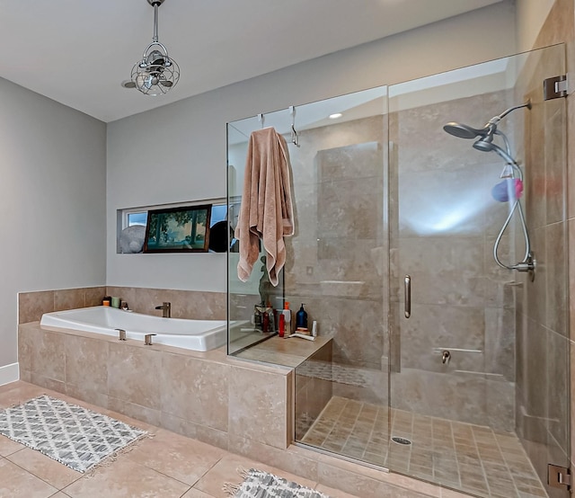 536 Rutland Pl, Houston, TX 77007 - bathroom featuring tile patterned floors, a garden tub, and a shower stall
