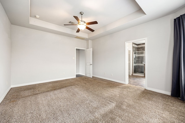 12510 Sherborne Castle Ct, Tomball, TX 77375 - carpeted empty room with a raised ceiling, a ceiling fan, and baseboards