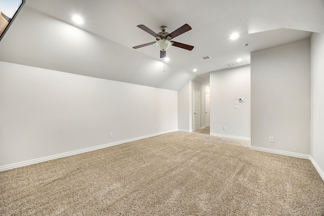 12510 Sherborne Castle Ct, Tomball, TX 77375 - additional living space with a ceiling fan, recessed lighting, vaulted ceiling, light carpet, and baseboards