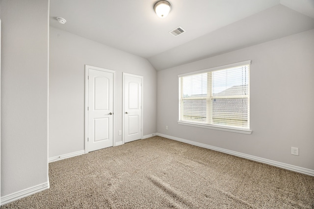 12510 Sherborne Castle Ct, Tomball, TX 77375 - unfurnished bedroom featuring vaulted ceiling, carpet, and baseboards