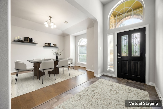 12510 Sherborne Castle Ct, Tomball, TX 77375 - foyer with a chandelier, baseboards, and wood finished floors