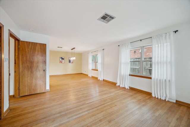 1219 Candlelight Ln, Houston, TX 77018 - empty room with light wood finished floors and baseboards