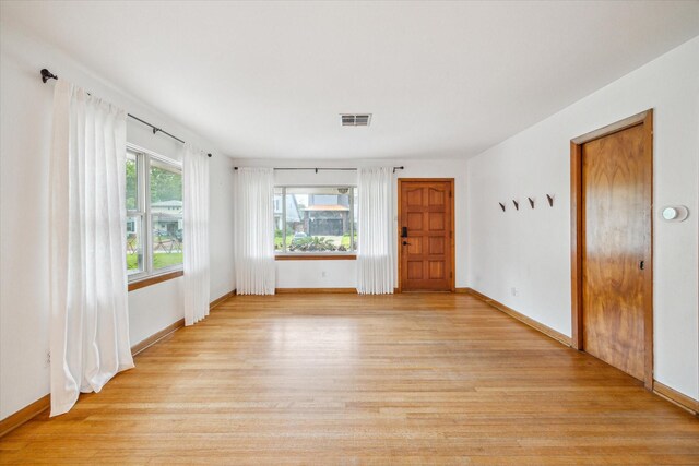 1219 Candlelight Ln, Houston, TX 77018 - spare room with light wood-type flooring and baseboards