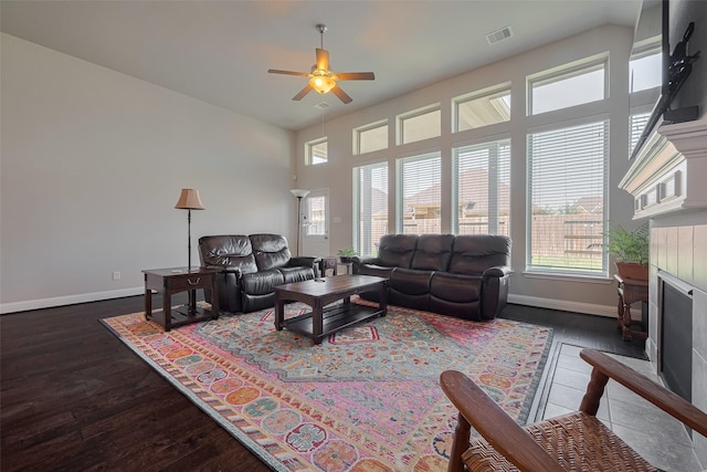 18526 Waterfall Creek Way, Cypress, TX 77429 - living room featuring plenty of natural light, ceiling fan, and dark wood-style flooring