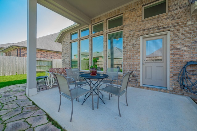 18526 Waterfall Creek Way, Cypress, TX 77429 - view of patio featuring outdoor dining space