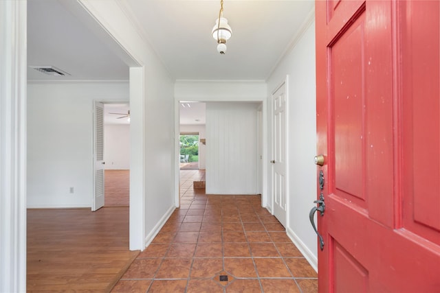 1908 Oak Shadows St, Baytown, TX 77520 - entrance foyer featuring ornamental molding, baseboards, and ceiling fan