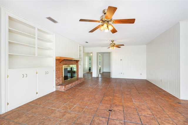 1908 Oak Shadows St, Baytown, TX 77520 - unfurnished living room with ceiling fan and a brick fireplace