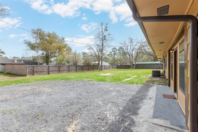 105A Butler Rd, Vidor, TX 77662 - view of yard with central air condition unit and a patio area