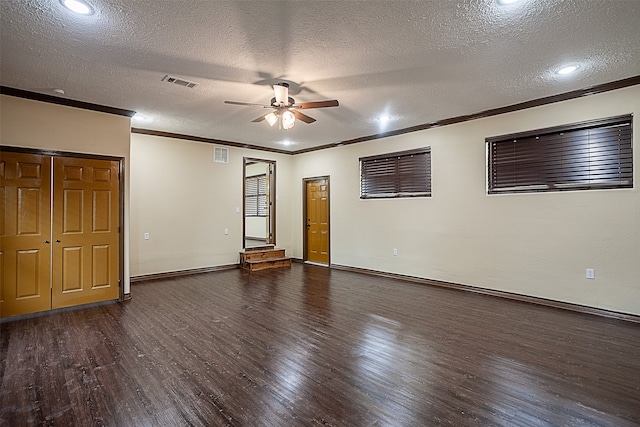 105A Butler Rd, Vidor, TX 77662 - spare room featuring a ceiling fan, wood finished floors, ornamental molding, a textured ceiling, and baseboards