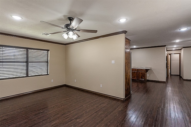 105A Butler Rd, Vidor, TX 77662 - spare room featuring crown molding, a ceiling fan, dark wood finished floors, baseboards, and recessed lighting