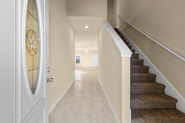 7754 Ave J, Houston, TX 77012 - entryway with stairway, light marble finish flooring, baseboards, recessed lighting, and a ceiling fan