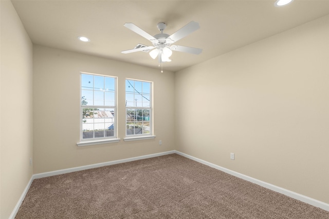 7754 Ave J, Houston, TX 77012 - spare room featuring carpet, recessed lighting, baseboards, and a ceiling fan