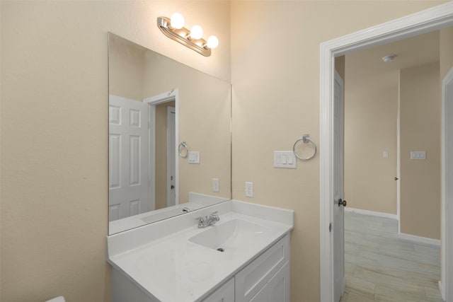7754 Ave J, Houston, TX 77012 - bathroom featuring vanity and baseboards