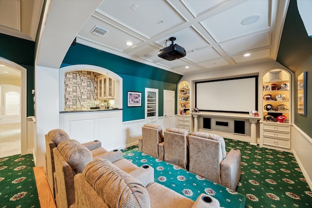10911 Kemwood Dr, Houston, TX 77024 - carpeted cinema featuring built in features, arched walkways, coffered ceiling, a wainscoted wall, and crown molding