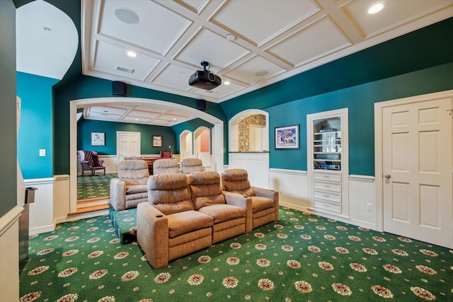 10911 Kemwood Dr, Houston, TX 77024 - home theater featuring coffered ceiling, wainscoting, carpet flooring, arched walkways, and recessed lighting