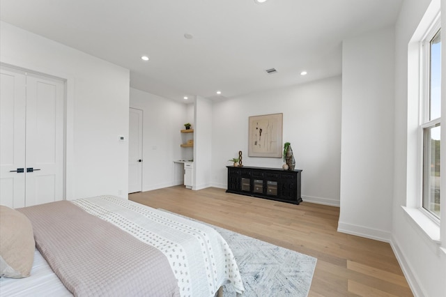 819 Dorothy St Unit B, Houston, TX 77008 - bedroom featuring light wood finished floors, recessed lighting, and baseboards