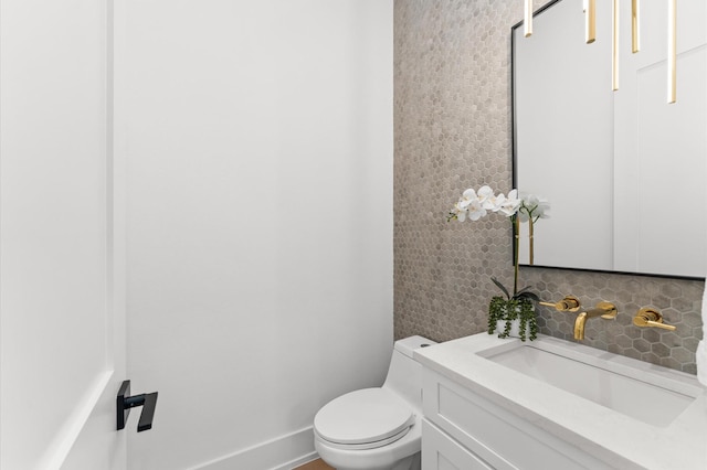 819 Dorothy St Unit B, Houston, TX 77008 - bathroom featuring backsplash, toilet, and vanity
