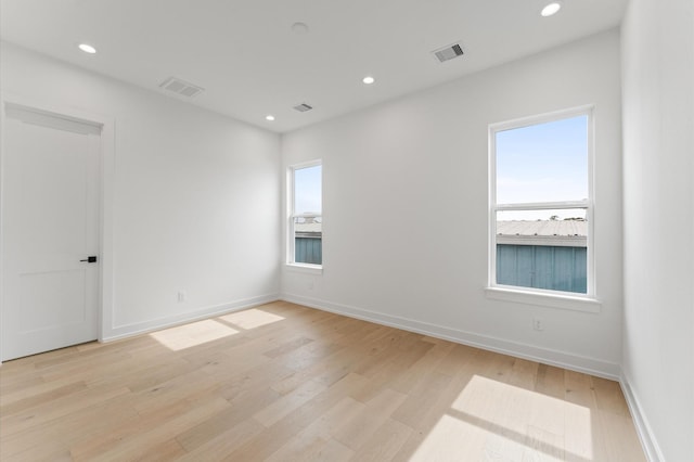 819 Dorothy St Unit B, Houston, TX 77008 - empty room featuring light wood-type flooring, recessed lighting, and baseboards