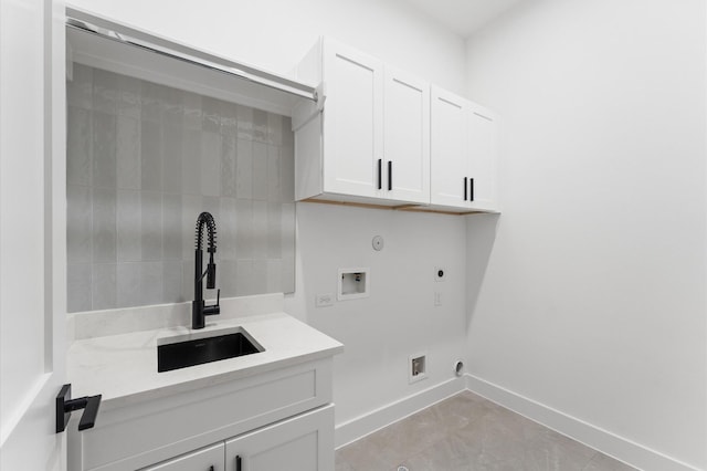 819 Dorothy St Unit B, Houston, TX 77008 - laundry room with electric dryer hookup, hookup for a washing machine, cabinet space, hookup for a gas dryer, and baseboards