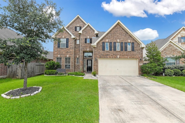 13823 Pointed Edge Ln, Cypress, TX 77429 - traditional home featuring an attached garage, driveway, and brick siding