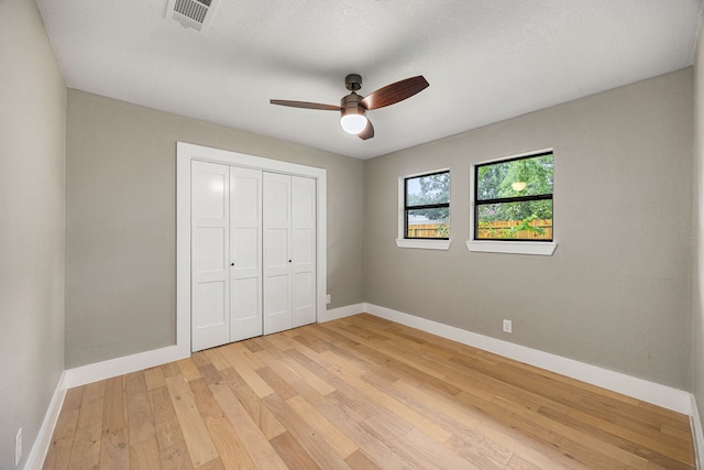 1931 Chaparral Dr, Houston, TX 77043 - unfurnished bedroom featuring light wood-style flooring, baseboards, a closet, and a ceiling fan