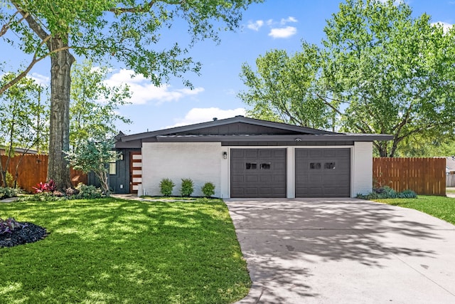 1931 Chaparral Dr, Houston, TX 77043 - view of front facade featuring concrete driveway, brick siding, and an attached garage