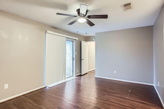 5607 Circlegate Dr, Spring, TX 77373 - unfurnished bedroom featuring baseboards, wood finished floors, a ceiling fan, and access to outside