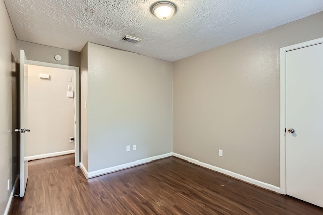 5607 Circlegate Dr, Spring, TX 77373 - spare room featuring wood finished floors, baseboards, and a textured ceiling