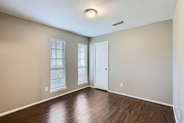 5607 Circlegate Dr, Spring, TX 77373 - unfurnished room featuring dark wood-style flooring and baseboards