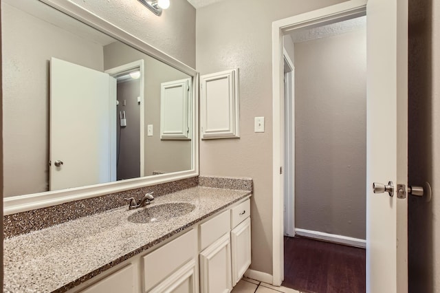 5607 Circlegate Dr, Spring, TX 77373 - bathroom with vanity and baseboards