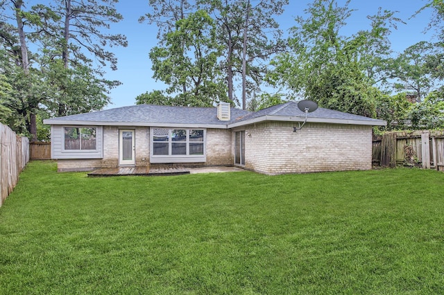 5607 Circlegate Dr, Spring, TX 77373 - rear view of house featuring brick siding, a chimney, and roof with shingles