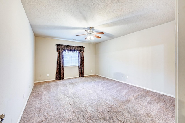 1752 Cypress Meadows Dr, Dickinson, TX 77539 - empty room with a ceiling fan, carpet floors, baseboards, and a textured ceiling