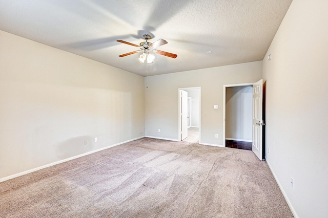1752 Cypress Meadows Dr, Dickinson, TX 77539 - unfurnished bedroom with carpet flooring, baseboards, and ceiling fan