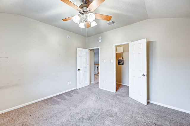 1752 Cypress Meadows Dr, Dickinson, TX 77539 - unfurnished bedroom featuring vaulted ceiling, carpet floors, baseboards, and a ceiling fan