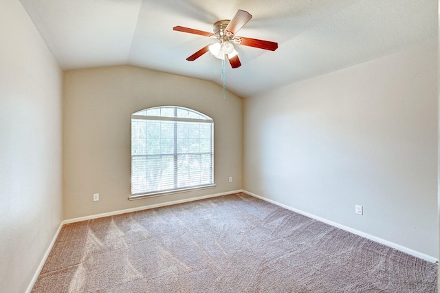 1752 Cypress Meadows Dr, Dickinson, TX 77539 - carpeted spare room with a ceiling fan, vaulted ceiling, and baseboards