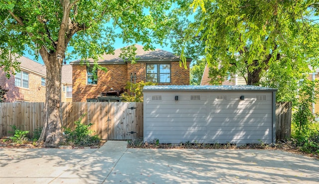 2308 Blodgett St, Houston, TX 77004 - view of front facade featuring a gate and brick siding