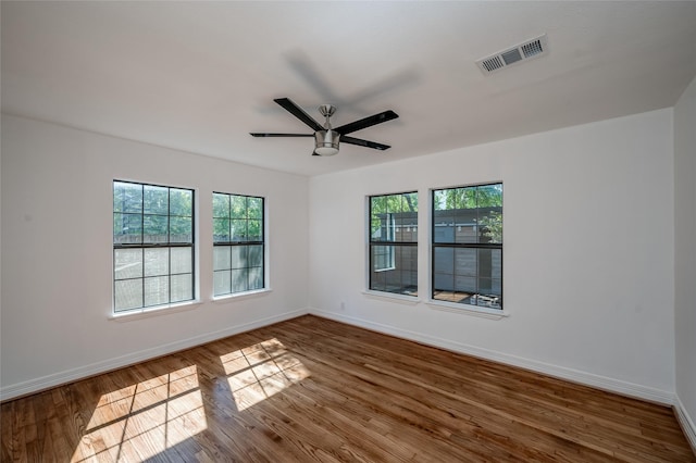 2308 Blodgett St, Houston, TX 77004 - spare room with baseboards, healthy amount of natural light, and wood finished floors