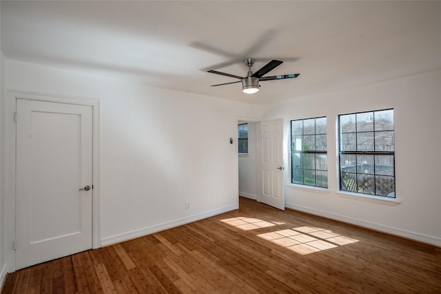 2308 Blodgett St, Houston, TX 77004 - unfurnished room with ceiling fan, wood finished floors, and baseboards