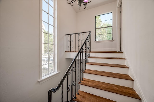 2308 Blodgett St, Houston, TX 77004 - stairs featuring a chandelier