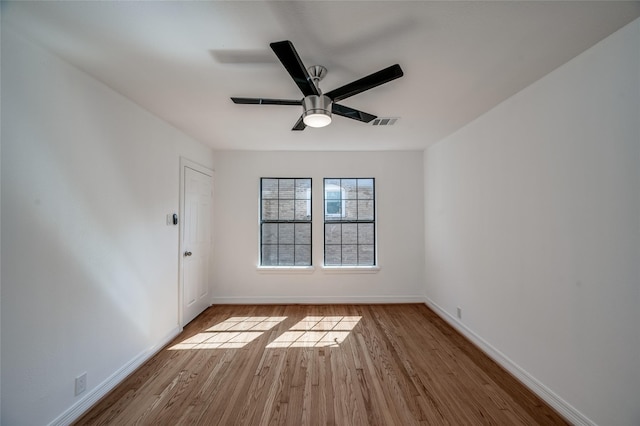 2308 Blodgett St, Houston, TX 77004 - unfurnished room featuring wood finished floors, a ceiling fan, and baseboards