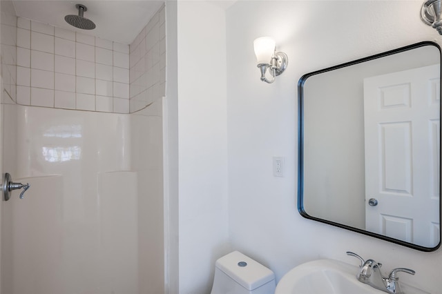 2308 Blodgett St, Houston, TX 77004 - full bath with a sink, a shower, and toilet
