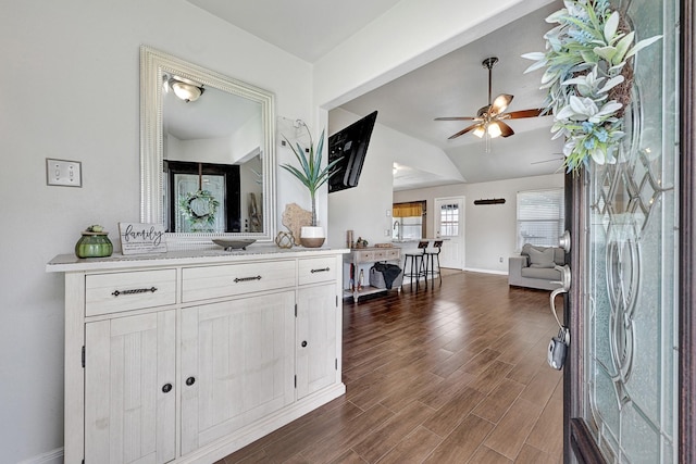 3902 Cary Creek Dr, Baytown, TX 77521 - foyer with a ceiling fan, dark wood finished floors, baseboards, and lofted ceiling