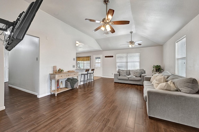 3902 Cary Creek Dr, Baytown, TX 77521 - living area with a ceiling fan, wood finished floors, vaulted ceiling, and baseboards