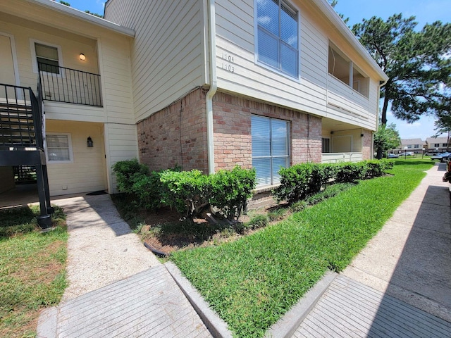 14515 Wunderlich Dr Unit 1703, Houston, TX 77069 - view of property exterior with brick siding