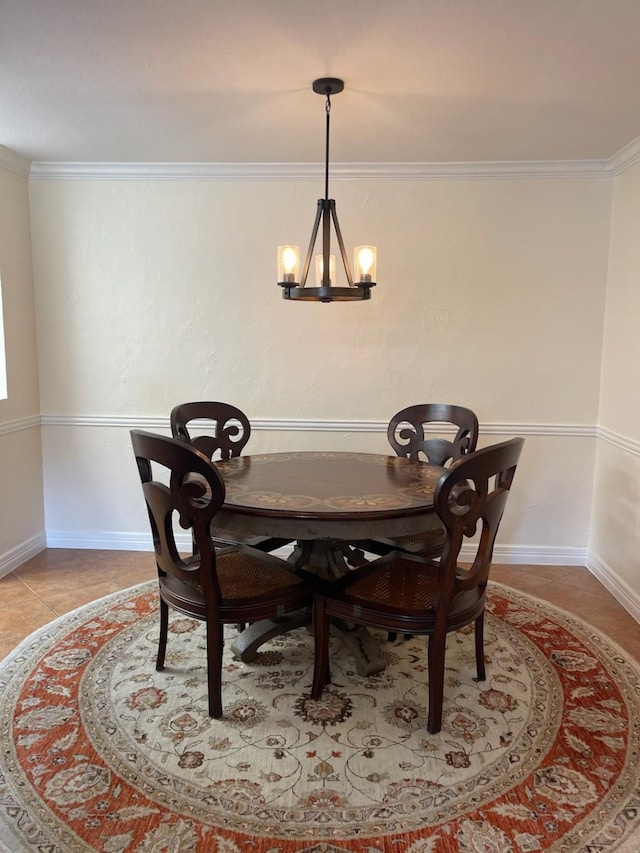 14515 Wunderlich Dr Unit 1703, Houston, TX 77069 - dining area featuring a chandelier, ornamental molding, baseboards, and tile patterned flooring
