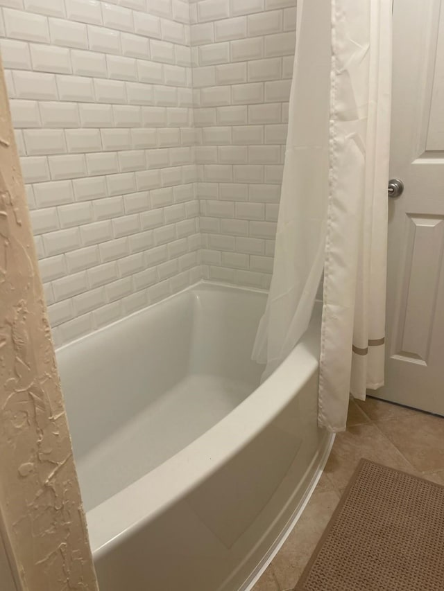 14515 Wunderlich Dr Unit 1703, Houston, TX 77069 - full bath featuring shower / tub combo with curtain and tile patterned flooring